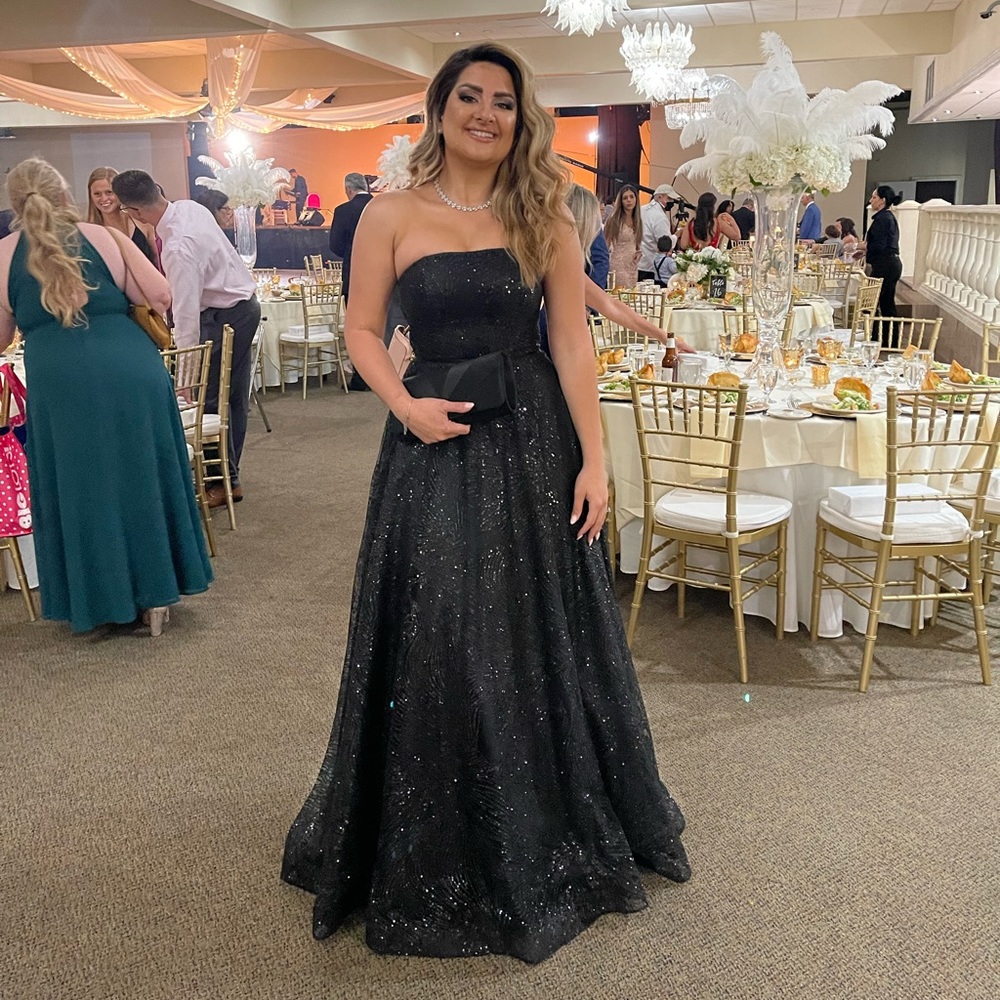 Cinderella divine black sparkly gown. Worn once as new. Size 4.